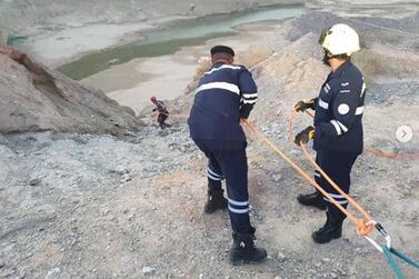 Two men were pulled to safety after falling at Wadi Al Bih in Ras Al Khaimah. Courtesy RAK Police