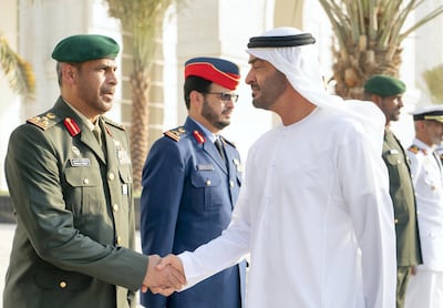 MAHWI, UNITED ARAB EMIRATES - September 04, 2019: HH Sheikh Mohamed bin Zayed Al Nahyan, Crown Prince of Abu Dhabi and Deputy Supreme Commander of the UAE Armed Forces (R), greets a member of the UAE Armed Forces, during the inauguration of the Presidential Guard Martyrs Park, at Mahwi Military Camp.

( Rashed Al Mansoori / Ministry of Presidential Affairs )
---