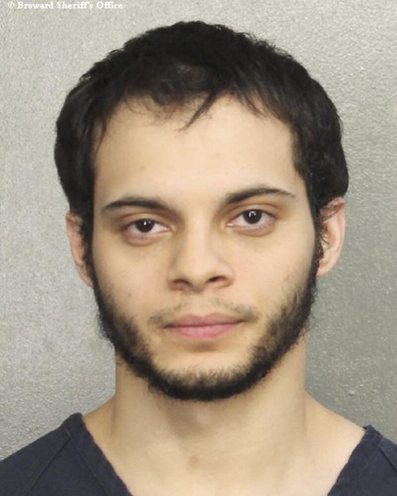 Esteban Santiago, 26, an Iraq war veteran, was in custody in connection with the killing of five people at Fort Lauderdale’s main airport. Broward Sheriff’s Office / AP Photo