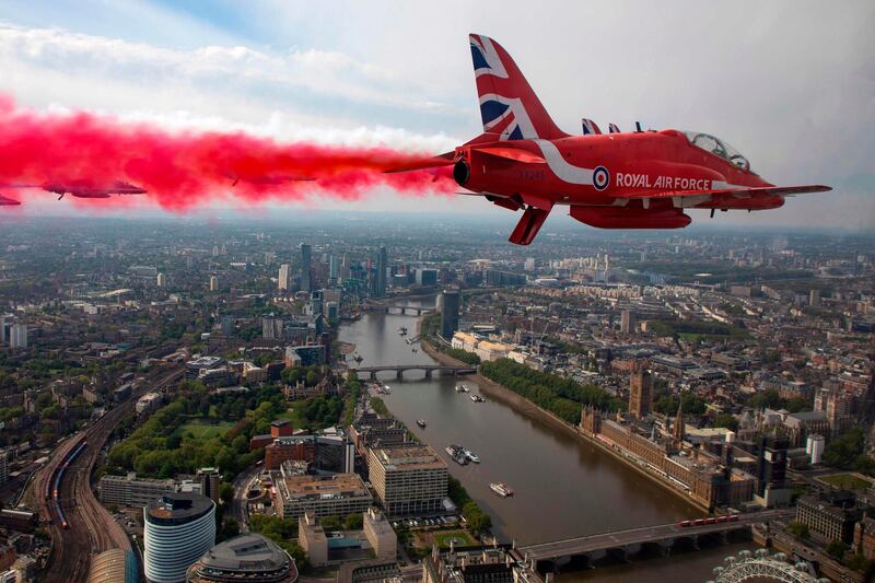 The Royal Air Force Red Arrows conduct a flypast over London to mark the 75th anniversary of VE Day (Victory in Europe Day), the end of the Second World War in Europe. AFP