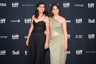 Actresses and sisters Manal Issa (L) and Nathalie Issa pose for a photograph on the red carpet at the Toronto International Film Festival. AP