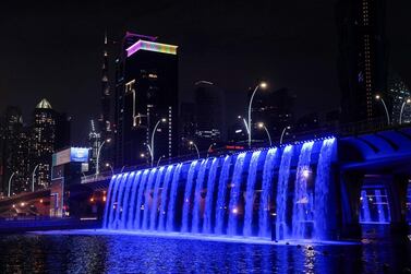 The waterfall over Dubai Canal lights up blue in support of Autism Awareness Month. Now Enoc and the RTA are showing their support for the campaign. Courtesy, WAM