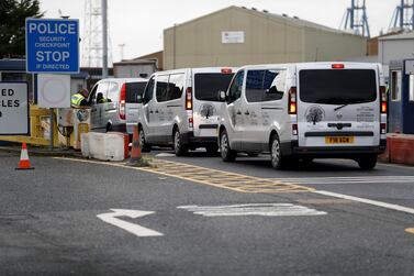 Vehicles belonging to a funeral home arrive at the Port of Tilbury, Essex where the bodies of 39 people are being held by the authorities, following their discovery in a lorry container on Wednesday morning. Reuters