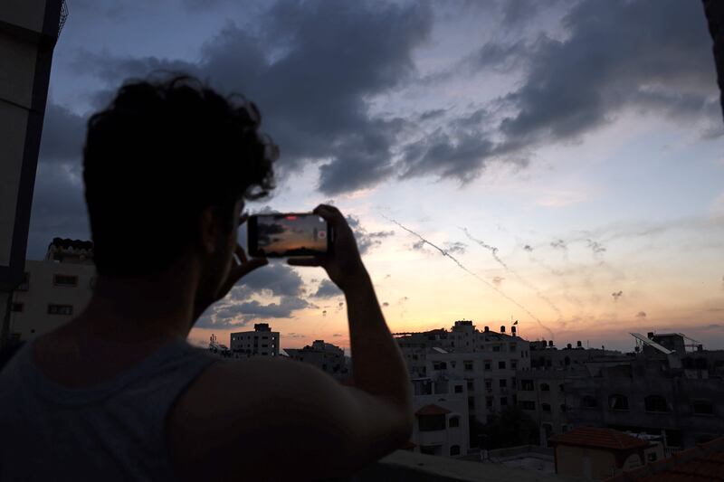 A barrage of rockets from Gaza City are filmed as they make their way towards Israel. AFP