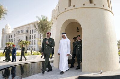 MAHWI, ABU DHABI, UNITED ARAB EMIRATES - September 04, 2019: HH Sheikh Mohamed bin Zayed Al Nahyan, Crown Prince of Abu Dhabi and Deputy Supreme Commander of the UAE Armed Forces (2nd R), inaugurates the Presidential Guard Martyrs Park, at Mahwi Military Camp. Seen with Major General Mike Hindmarsh, Commander of the UAE Presidential Guard (back R) and HE Lt General Hamad Thani Al Romaithi, Chief of Staff UAE Armed Forces (back 2nd R).

( Hamad Al Kaabi / Ministry of Presidential Affairs )​
---
