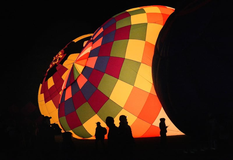 Visitors to the Albuquerque International Balloon Fiesta. AP Photo