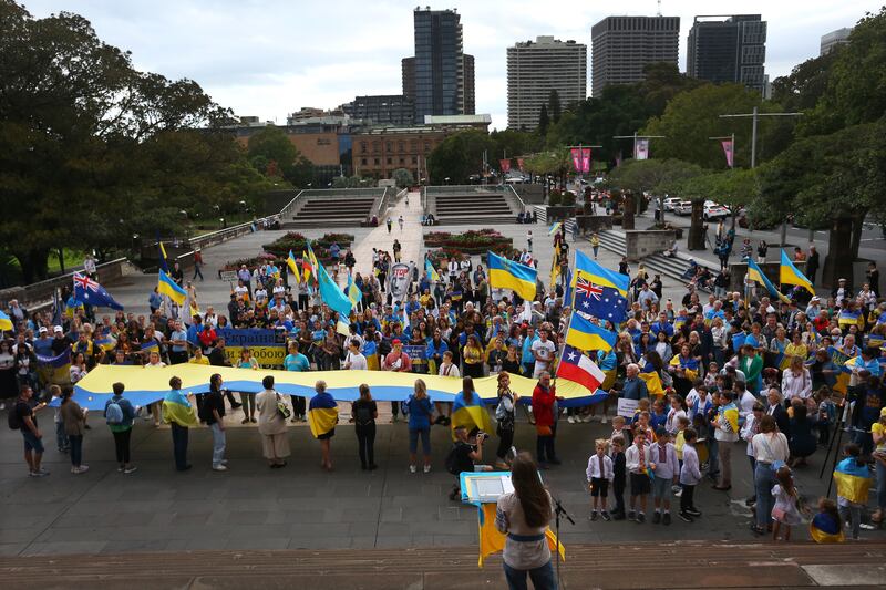 Supporters gather at St Mary's Cathedral Square during the 365 Days Strong rally and candlelight vigil in Sydney. Getty