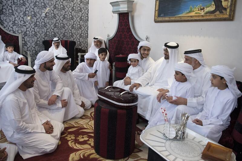 Sheikh Mohammed bin Zayed, Crown Prince of Abu Dhabi and Deputy Supreme Commander of the Armed Forces, offers condolences to Mohamed Eissa Al Hammadi (3rd R), father of Abdullah Mohamed Eissa Al Hammadi. Hamad Al Kaabi / Crown Prince Court — Abu Dhabi