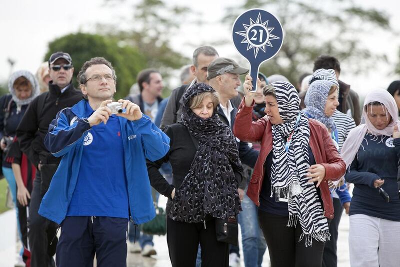 Estimates put the direct contribution of travel and tourism to the Emirates' GDP at Dh56.5 billion last year, representing 4 per cent of total GDP. Above, tourists at the Sheikh Zayed Grand Mosque in Abu Dhabi. Silvia Razgova / The National