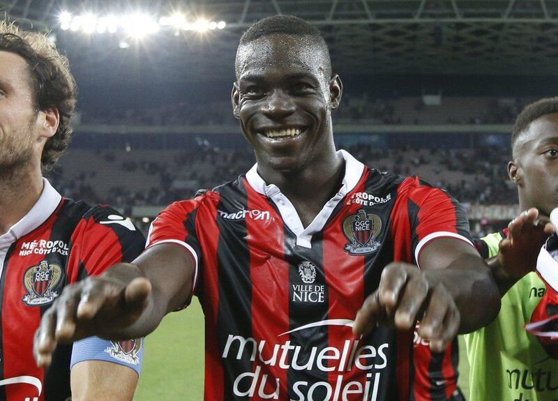 Nice's Italian forward Mario Balotelli celebrates his team's victory at the end of the French Ligue 1 against Marseille on September 11, 2016 at the Allianz Riviera stadium in Nice, southeastern France. AP Photo