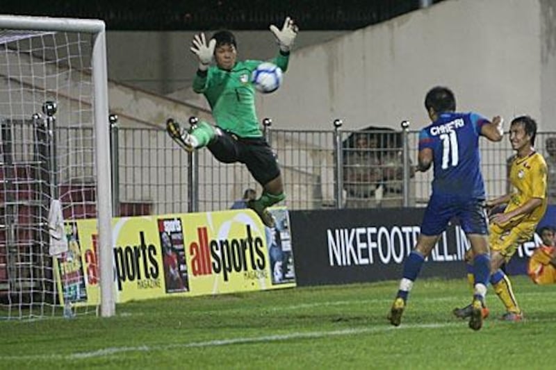 India force a leaping save by Thailand’s goalkeeper during a sparsely attended international friendly in New Delhi last month.
