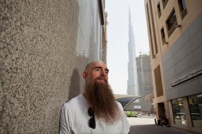 DUBAI, UNITED ARAB EMIRATES - OCTOBER 5:  Logan Hicks, a New York city street artist in Dubai, UAE, on October 5, 2016. The artist is in town taking hundreds of photos ahead of designing a mural using hand-sprayed stencils that will be featured in City Walk, Dubai, early next year.  (Randi Sokoloff for The National)  *** Local Caption ***  RS-032-051016-LOGAN.jpg