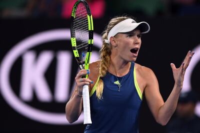 epa06467941 Caroline Wozniacki of Denmark reacts during her women's quarter final match against Carla Suarez Navarro of Spain at the Australian Open tennis tournament, in Melbourne, Victoria, Australia, 23 January 2018.  EPA/LUKAS COCH AUSTRALIA AND NEW ZEALAND OUT