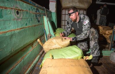 Petty Officer Electronics Technician Leslie Floyd numbers parcels of seized narcotics as HMAS Warramunga’s boarding team conduct an illicit cargo seizure. Courtesy Commonwealth of Australia *** Local Caption *** HMAS Warramunga intercepted and boarded a suspect vessel in international waters in the Arabian Sea on 03 January 2018 around 0830 (AEDT) with the support of a UK Royal Navy helicopter, seizing more than 3.5 tonnes of hashish, estimated to be valued at more than AUD$180 million. The operation was planned by the Combined Maritime Forces’ (CMF) Combined Task Force 150 (CTF-150) which is commanded by Australia and supported by a combined Australian-Canadian staff.

Warramunga is deployed on Operation MANITOU, supporting international efforts to promote maritime security, stability and prosperity in the Middle East region (MER).  

Warramunga routinely supports CMF operations. The CMF is a 32-nation partnership focused on defeating terrorism, preventing piracy, encouraging regional cooperation and promoting a safe maritime environment.

Warramunga is on her third deployment to the MER and is the 66th rotation of a Royal Australian Navy vessel to the region since 1990.