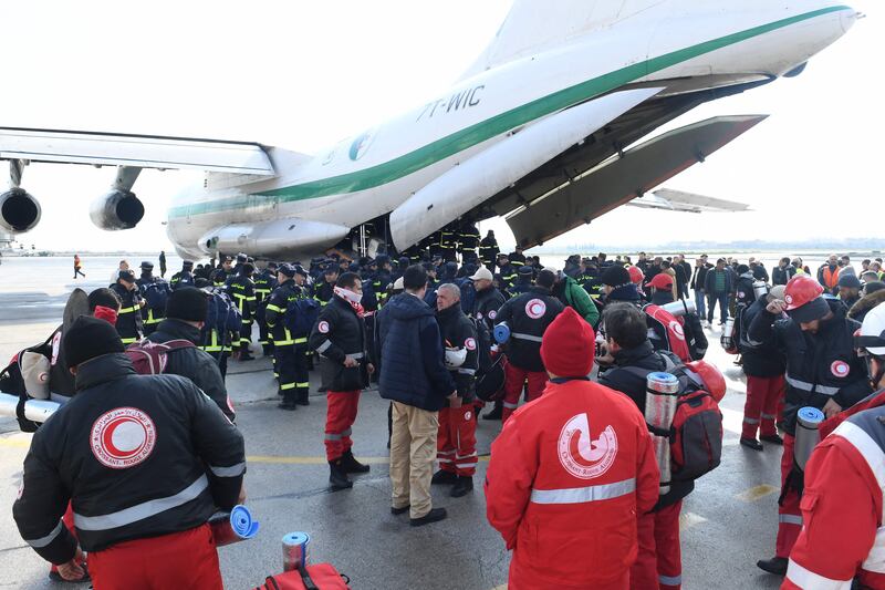 Algerian rescue teams arrive at Aleppo International Airport. AFP