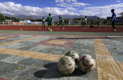 Players of the Lhasa Chengtou club train at Lhasa, but they likely have to travel long distances to play league matches. How Hwee Young / EPA