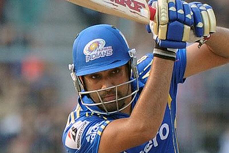 Rohit Sharma, pictured batting with the Mumbai Indians last season, helped steady them against the Pune Warriors India to an eventual win with seven balls to spare.