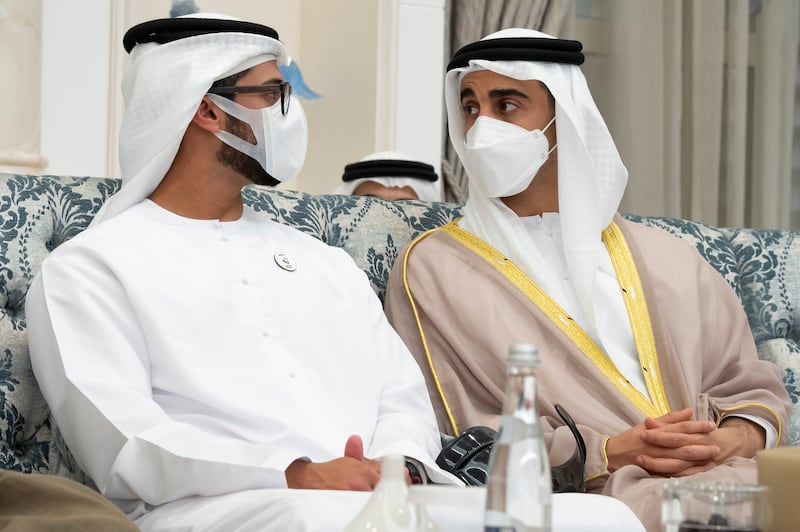 Sheikh Hamdan bin Mohamed bin Zayed, right, speaks with  Sheikh Zayed bin Hamdan bin Zayed. Photo: Abdulla Al Neyadi for the Ministry of Presidential Affairs 