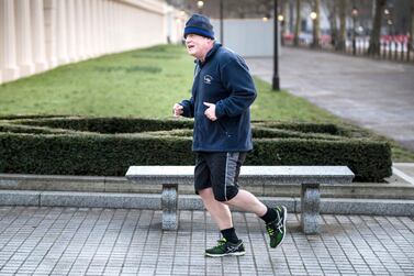 Boris Johnson out running, practising what he is preaching to the British public. Shutterstock