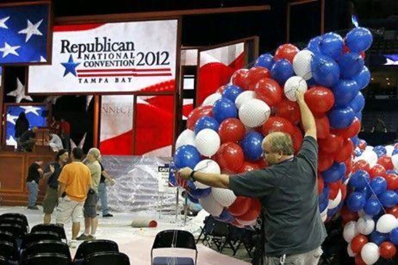 A technician prepares balloons to be dropped from the ceiling at the Republican National Convention in Tampa, Florida on Friday. The convention starts Monday.