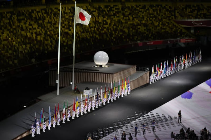 Flags of the participating nations are displayed in the parade of athletes during the opening ceremony. Getty