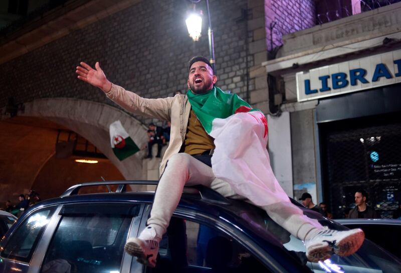 Algerians celebrate in Algiers. AFP