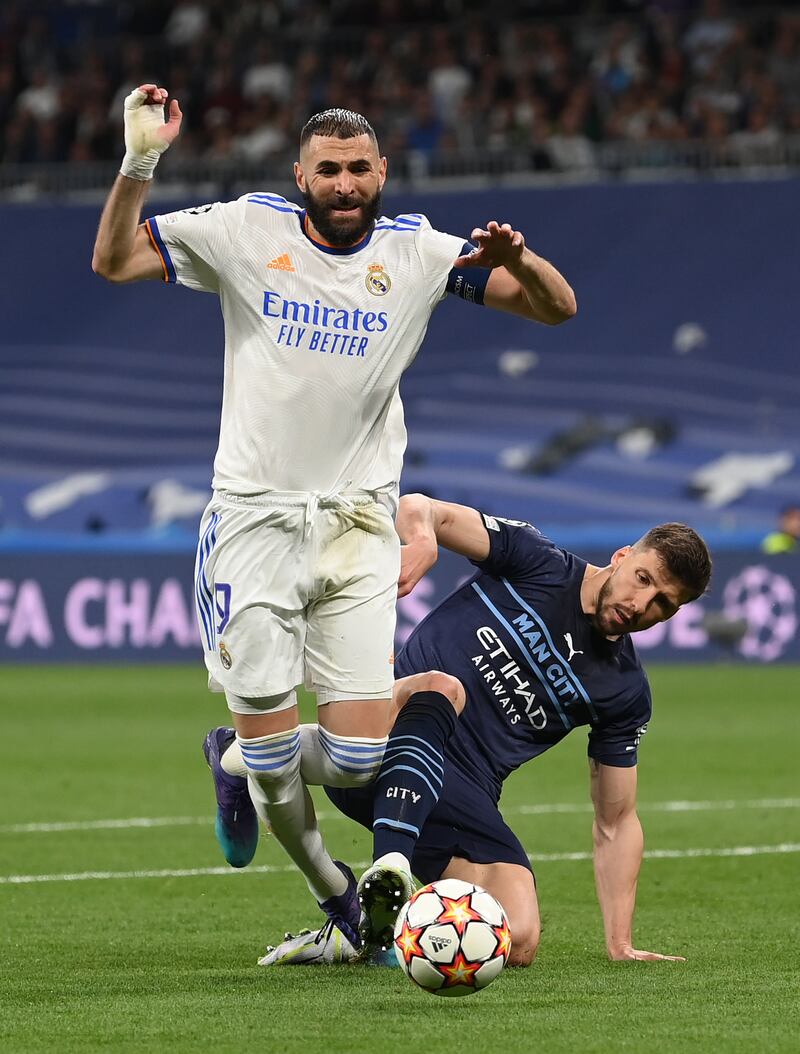 Ruben Dias - 7: Suspended for first leg and back with the thankless task of containing Benzema – and barely given him kick for most of game only for Frenchman to provide assist for Rodrygo’s first goal. Then brought down the same player for extra-time penalty that Benzema finished himself. Getty