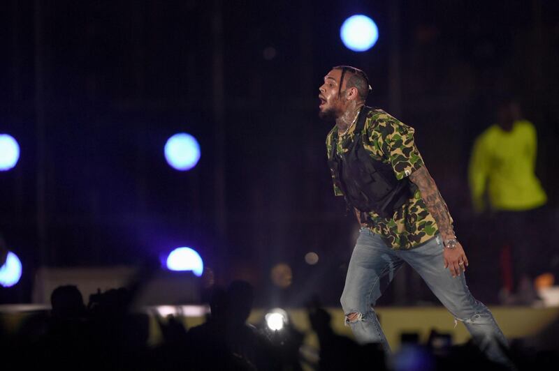 Chris Brown joined Janet Jackson and 50 Cent in Saudi Arabia/ AFP / AMER HILABI