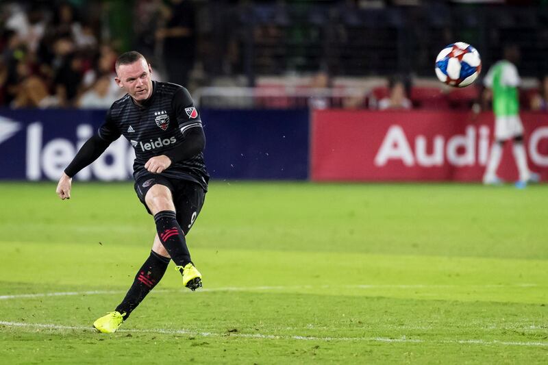 FILE PHOTO: Aug 4, 2019; Washington, DC, USA; D.C. United forward Wayne Rooney kicks the ball against the Philadelphia Union during the second half at Audi Field. Mandatory Credit: Scott Taetsch-USA TODAY Sports/File Photo