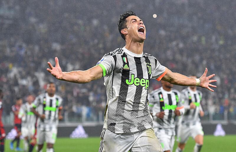 epa07961189 Juventus' Cristiano Ronaldo celebrates after scoring during the Italian Serie A soccer match between Juventus FC and Genoa CFC at Allianz stadium in Turin, Italy, 30 October 2019.  EPA/ALESSANDRO DI MARCO