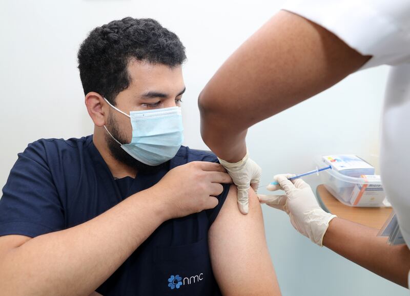 Anuj Dahal receives his Pfizer Covid-19 vaccine at the NMC Royal Hospital DIP in Dubai.