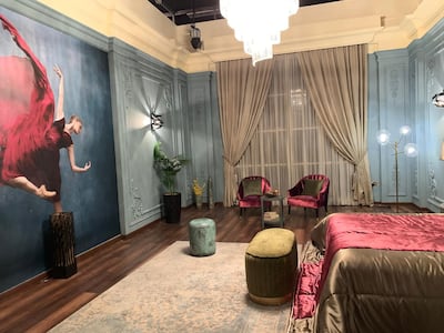 Within the walls of the Musaffah warehouse lie the Baroque-style rooms of the palaces of the two families in the show. Razmig Bedirian / The National