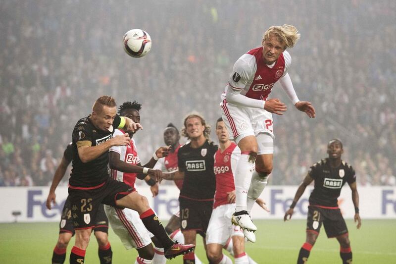 Ajax’s Kasper Dolberg attempts a header on goal against Standard Liege. AFP / Olaf Kraak