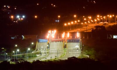 TOPSHOT - This photo taken on February 14, 2019 shows a general view of the Tienditas International Bridge border with Venezuela, in Cucuta, Colombia.   Venezuela is plagued by hyperinflation and major shortages of basic goods, and two men -- opposition leader Juan Guaido and President Nicolas Maduro -- are vying for control of the country. Guaido and Maduro have been locked in a battle over allowing aid into the country, and the military reinforced a blockade on February 14 at the border with Colombia, where the opposition leader has vowed to bring in desperately-needed goods. / AFP / Raul Arboleda
