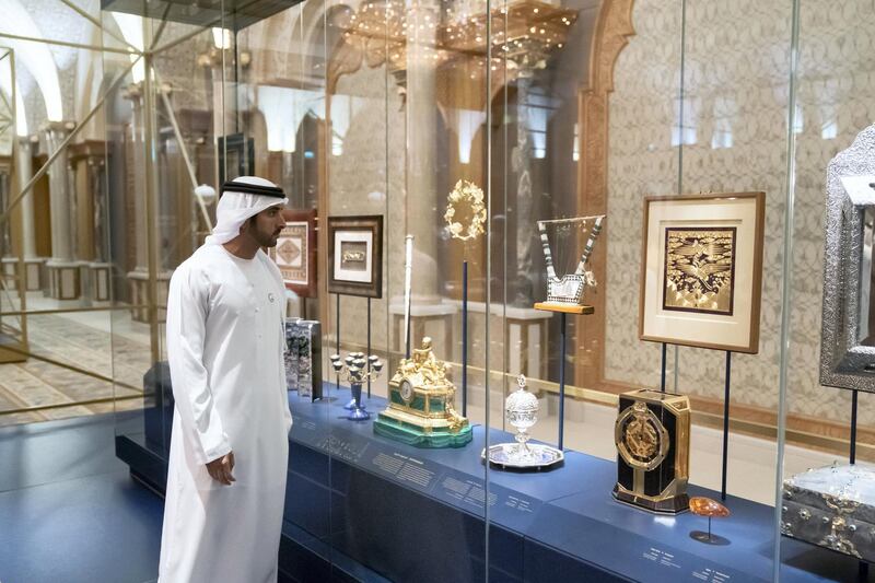 ABU DHABI, UNITED ARAB EMIRATES - March 10, 2019: HH Sheikh Hamdan bin Mohamed Al Maktoum, Crown Prince of Dubai (C), tours the Presidential Gifts Exhibition, at Qasr Al Watan.
( Mohamed Al Raeesi for the Ministry of Presidential Affairs )
---