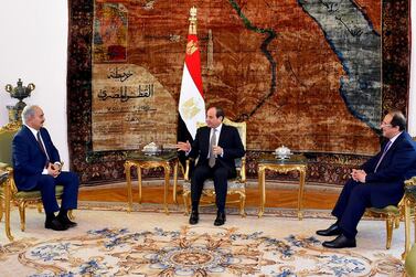 This handout by the Egyptian Presidency on April 14, 2019, shows Egyptian president Abdel Fattah El Sisi and intelligence chief Abbas Kamel (R) meeting Libyan commander Khalifa Haftar at the presidential Palace in Cairo. AFP