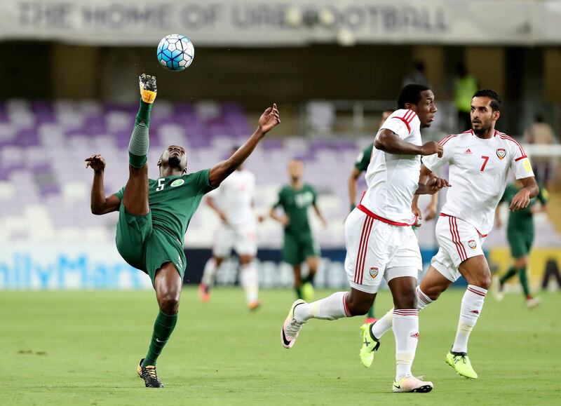 Al Ain, United Arab Emirates - August 29th, 2017: UAE's Ahmed Khalil (M) and Saudi's Omar Ibrahim Othman during the World Cup qualifying game between UAE v Saudi Arabia. Tuesday, August 29th, 2017 at Hazza Bin Zayed Stadium, Al Ain. Chris Whiteoak / The National