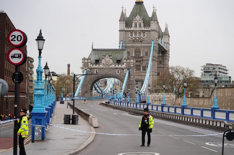 Police officers block access to Tower Bridge. PA
