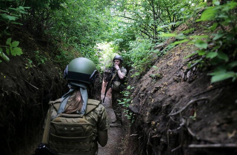 Ukrainian servicemen near Zaytseve village in Donetsk, Ukraine. EPA