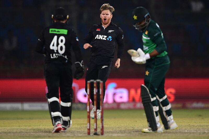New Zealand's Glenn Phillips celebrates after taking the wicket of Pakistan's Haris Sohail. AFP