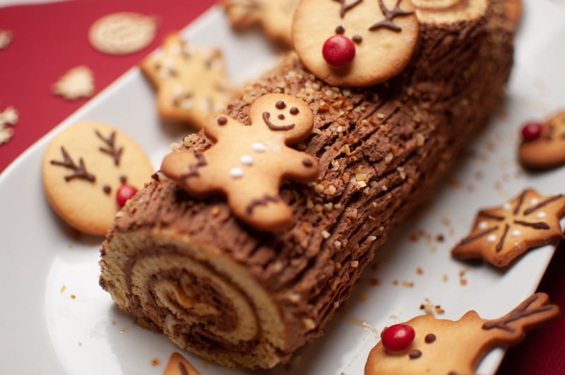 The chocolate Yule log originated in France and was based on a wooden log burned over the 12 days of Christmas. Photo: Kisoulou / Unsplash 