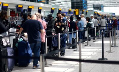 Passengers queue for check-in at Heathrow's Terminal 5. It was the busiest year for the terminal since it opened 15 years ago. Reuters