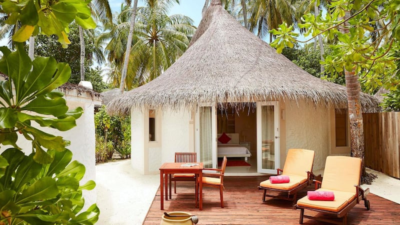 A beach villa at Sun Siyam Vilu Reef, where stays cost from $245 per night.