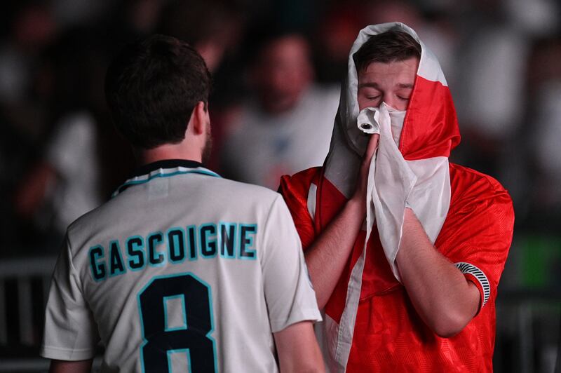 England supporters in Manchester react to the final defeat, after two of their side's penalties were saved.