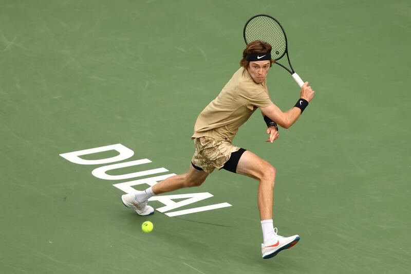 DUBAI, UNITED ARAB EMIRATES - MARCH 16: Andrey Rublev of Russia plays a backhand during his singles match against Emil Ruusuvuori of Finland during Day Ten of the Dubai Duty Free Tennis at Dubai Duty Free Tennis Stadium on March 16, 2021 in Dubai, United Arab Emirates. (Photo by Francois Nel/Getty Images)