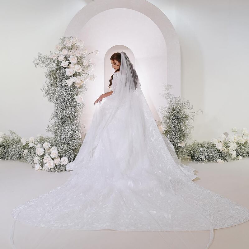 Designer Ezra Santos says the wedding dress was made in a record seven days at his Dubai atelier