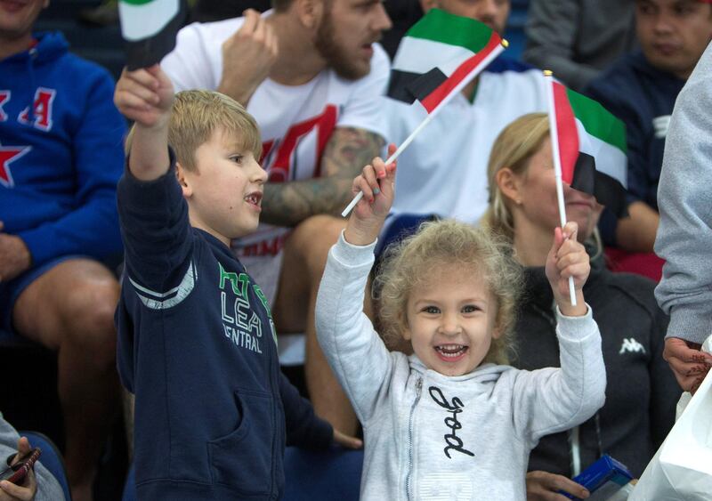 ABU DHABI, UNITED ARAB EMIRATES - UAE fans cheering their team at the AD Storms vs Belarus final game at the Ice Hockey President Cup 2018, Zayed Sport City Ice Rink, Abu Dhabi.  Leslie Pableo for The National