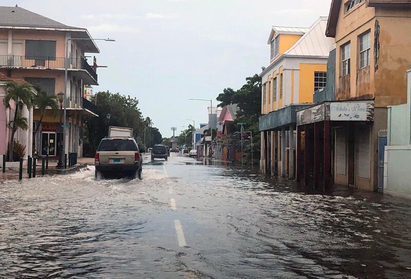 View of a flooded street in downtown Nassau.  AFP