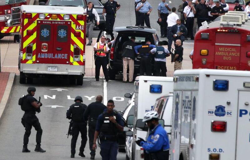 Emergency vehicles and police respond to a reported shooting at an entrance to the Washington Navy Yard on Monday. Alex Wong / Getty Images / AFP