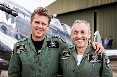 epa07758555 A handout picture provided by the British Ministry of Defence (MOD) showing Matt Jones (L) and Steve Brooks (R) in front of their Silver Spitfire before taking off on their round the world flight, at Goodwood Aerodrome, Hampshire, southern England, 05 August 2019, issued 06 August 2019. The MOD report that in 2019 the two aviators will attempt to fly a Silver Spitfire around the world, taking in some of the most famous landmarks on the planet from the Grand Canyon in the West to the snow-capped peak of Mount Fuji in the East. The Spitfire is a British treasure and an emblem of freedom across the globe. The Silver Spitfire expedition will hopefully promote the â€˜Best of Britishâ€™ worldwide showcasing the nationâ€™s heritage in engineering excellence, and an aircraft that changed the course of history. The Spitfire embodies not only a pinnacle in aerospace engineering and design but commemorates a generation of intrepid aviators prepared to stand up to oppression and make the ultimate sacrifice in pursuit of freedom. The expedition will reunite the Spitfire with the many countries that owe their freedom, at least in part, to this iconic aircraft. The unmistakable sight and sound of this aircraft once again gracing the skies aims to inspire future generations more than eighty years after R.J. Mitchellâ€™s timeless design first graced the skies.  EPA/SAC ED WRIGHT RAF / BRITISH MINISTRY OF DEFENCE / HANDOUT MANDATORY CREDIT: MOD/CROWN COPYRIGHT HANDOUT EDITORIAL USE ONLY/NO SALES